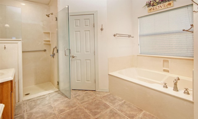 bathroom with independent shower and bath, vanity, and tile patterned floors