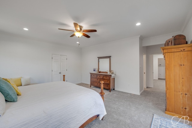 carpeted bedroom with crown molding and ceiling fan