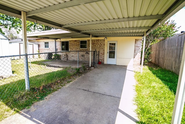 view of patio / terrace with a carport