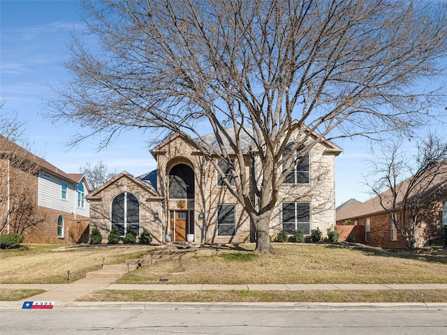 view of front facade with a front yard