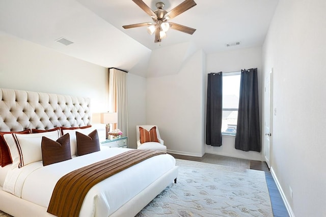 bedroom with lofted ceiling and ceiling fan