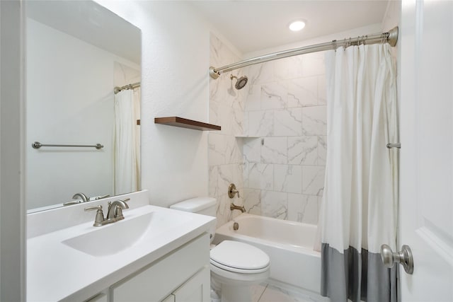 full bathroom featuring shower / tub combo with curtain, vanity, and toilet