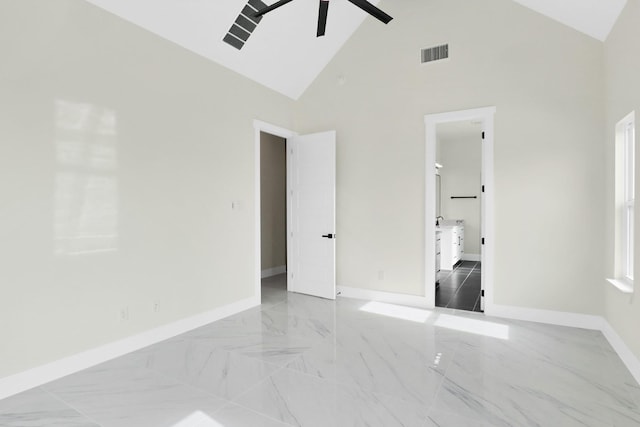 unfurnished bedroom featuring high vaulted ceiling and ceiling fan