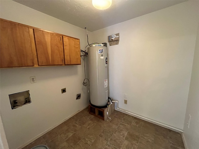 washroom with cabinets, washer hookup, electric water heater, and hookup for an electric dryer