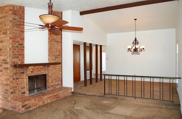 unfurnished living room with vaulted ceiling with beams, carpet, ceiling fan, a brick fireplace, and a textured ceiling