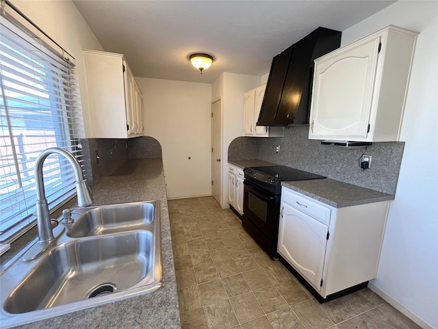 kitchen featuring extractor fan, sink, white cabinetry, black range with electric cooktop, and decorative backsplash