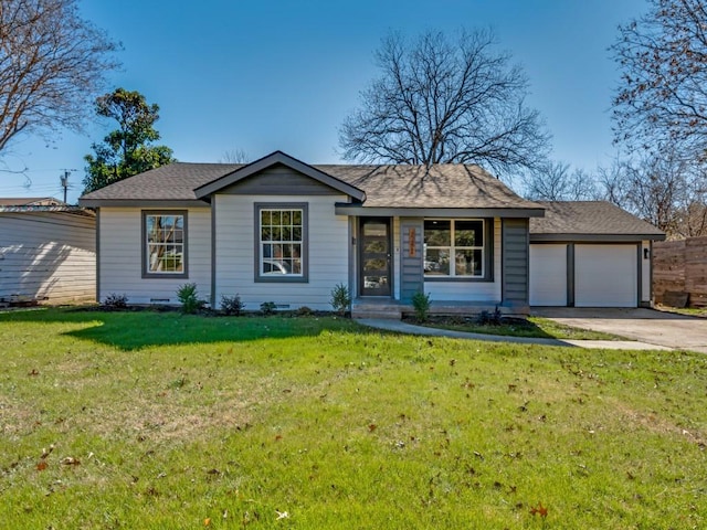 ranch-style house featuring a garage and a front lawn