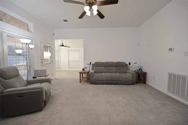 living room with light carpet and ceiling fan