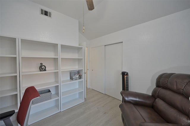 sitting room with light hardwood / wood-style floors and ceiling fan