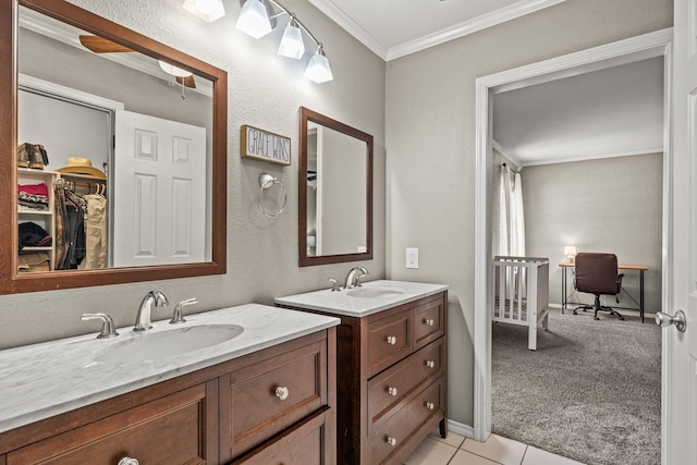 bathroom with vanity, tile patterned flooring, and ornamental molding