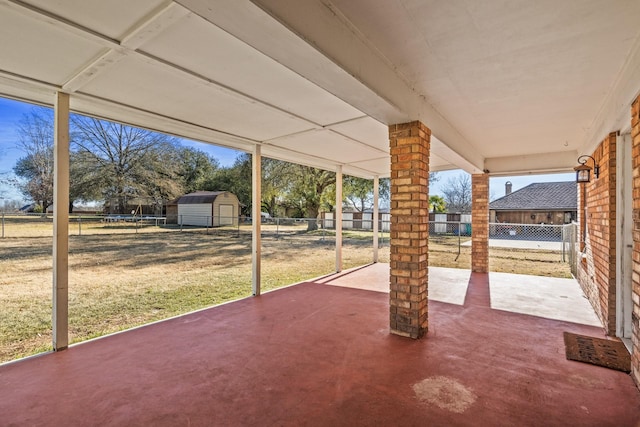 view of patio / terrace featuring a storage shed