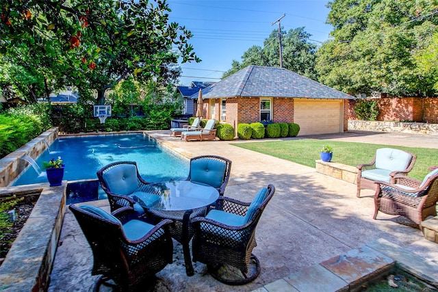 view of swimming pool featuring a fenced in pool, a patio area, a fenced backyard, and an outdoor structure