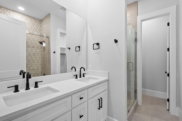 bathroom with vanity and walk in shower