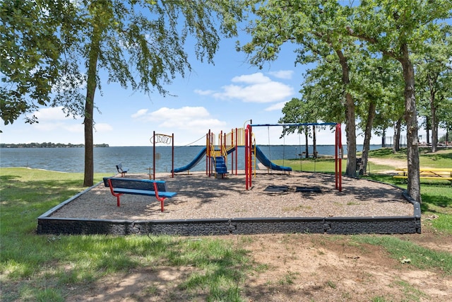 view of playground featuring a water view