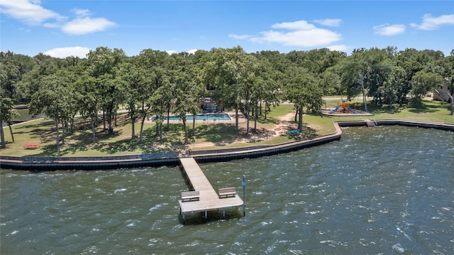 dock area featuring a playground and a water view