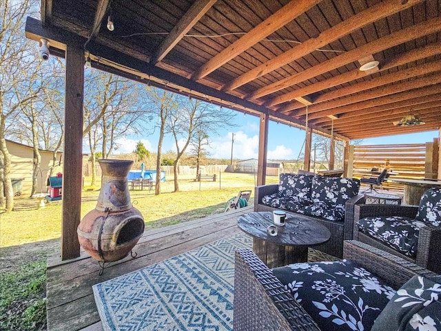 view of patio / terrace featuring a wooden deck and an outdoor hangout area