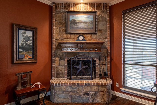 166 Cactus Dr, Decatur, TX 76234 - details with baseboards, ornamental molding, wood finished floors, and a fireplace