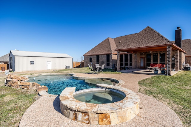 166 Cactus Dr, Decatur, TX 76234 - view of swimming pool with a pool with connected hot tub, a patio, and a yard