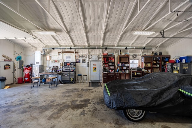 166 Cactus Dr, Decatur, TX 76234 - garage with a workshop area