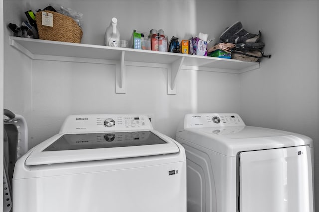 laundry area with washing machine and dryer