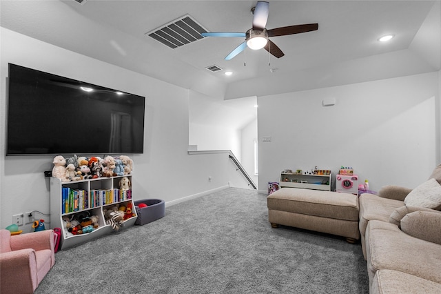 carpeted living room featuring ceiling fan