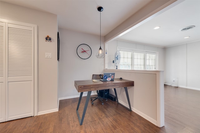 home office with dark hardwood / wood-style floors