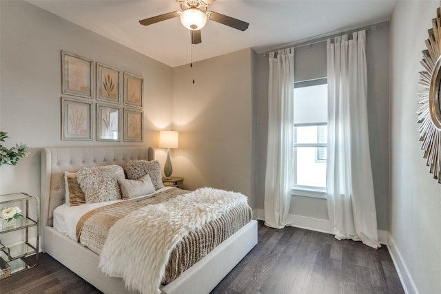 bedroom featuring dark hardwood / wood-style flooring and ceiling fan