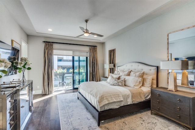 bedroom featuring access to exterior, hardwood / wood-style floors, and ceiling fan