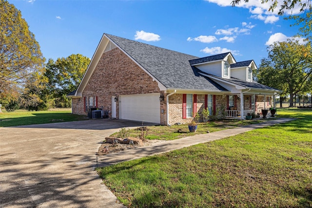 view of home's exterior featuring a garage, central AC unit, covered porch, and a lawn