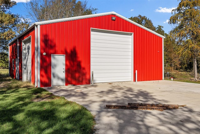 view of outdoor structure with a garage