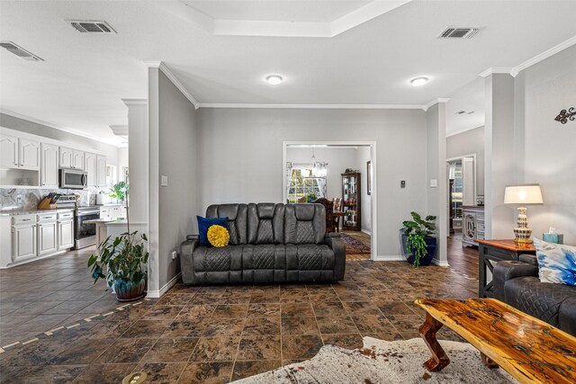 living room featuring ornamental molding