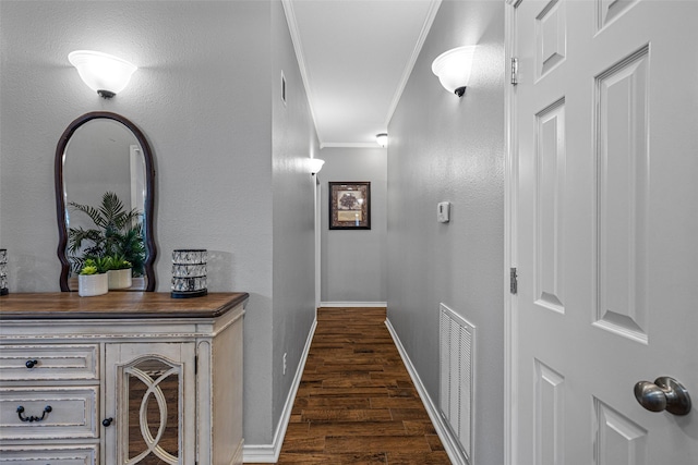 hall featuring crown molding and dark wood-type flooring