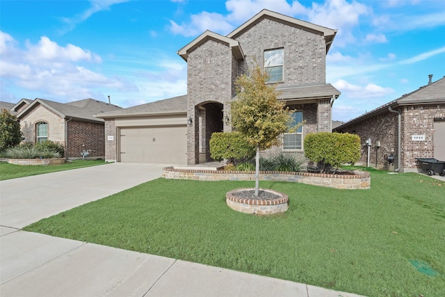 view of front of home featuring a garage and a front lawn