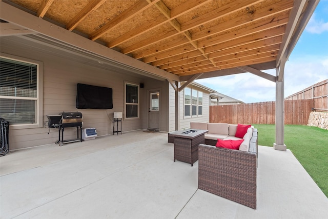 view of patio / terrace featuring an outdoor living space with a fire pit