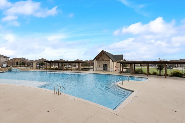 view of swimming pool featuring a patio area