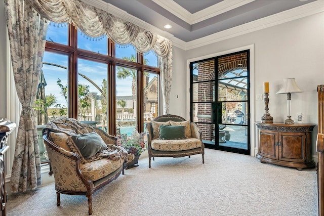 sitting room with ornamental molding