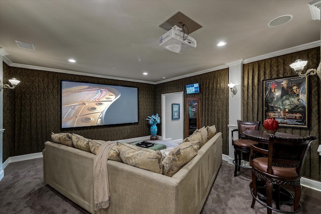 cinema featuring crown molding and carpet flooring