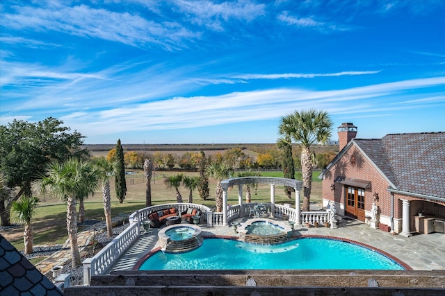 view of pool featuring an in ground hot tub, a gazebo, and a patio area