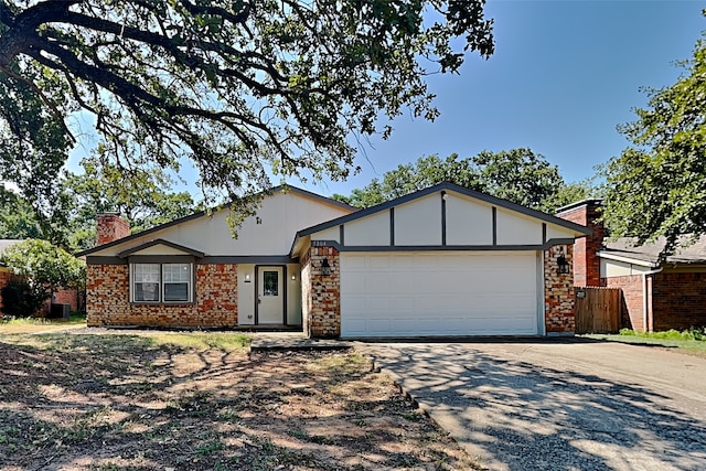 ranch-style house featuring a garage