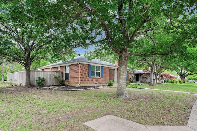 ranch-style house with a front yard