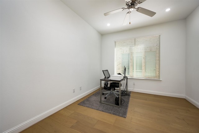 office featuring ceiling fan and light hardwood / wood-style floors