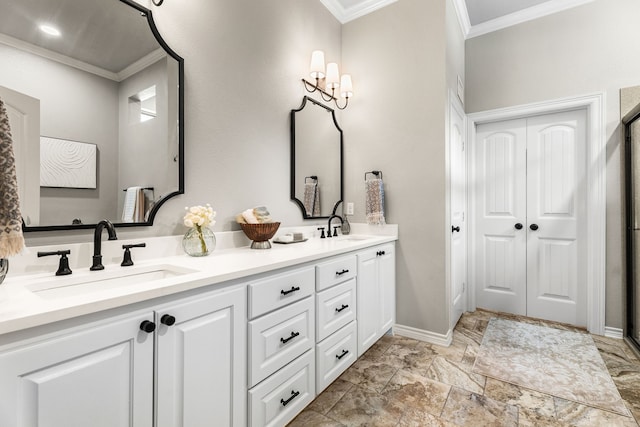 bathroom featuring ornamental molding and vanity