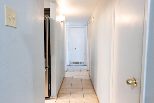 hallway with light tile patterned flooring