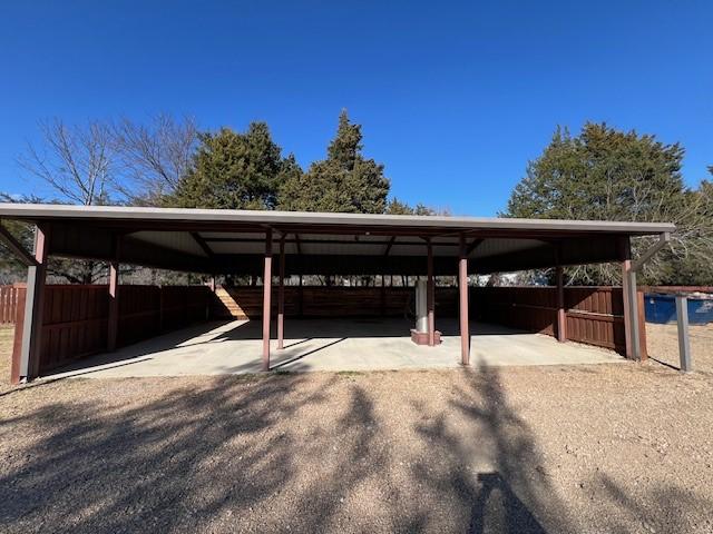 view of car parking with a carport