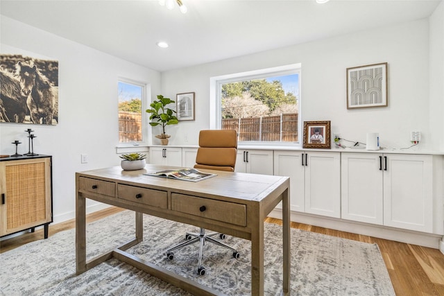 office space featuring light wood-type flooring