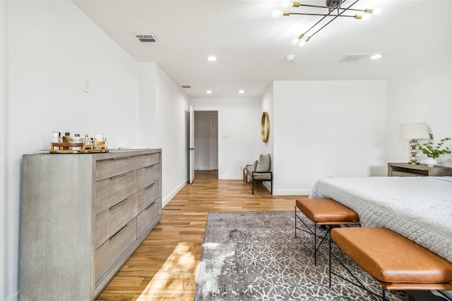 bedroom featuring recessed lighting, light wood-type flooring, baseboards, and visible vents