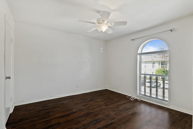15914 Stillwood St Unit 2078, Dallas, TX 75248 - empty room with dark wood-type flooring, a ceiling fan, and baseboards