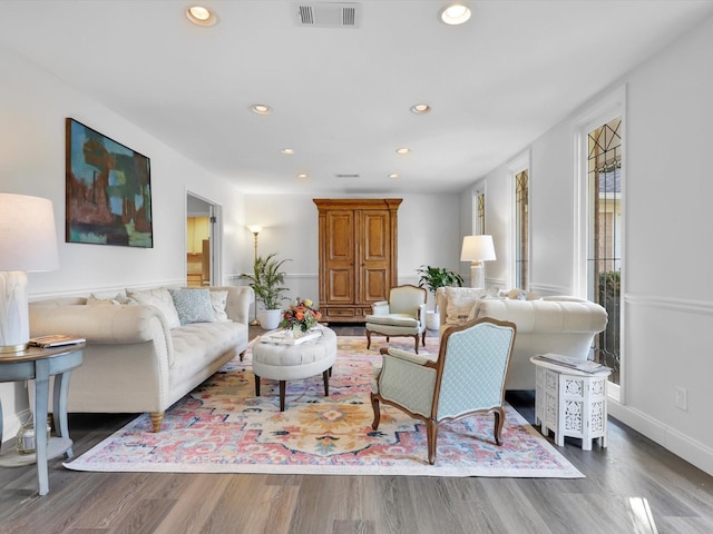 living room featuring dark hardwood / wood-style flooring