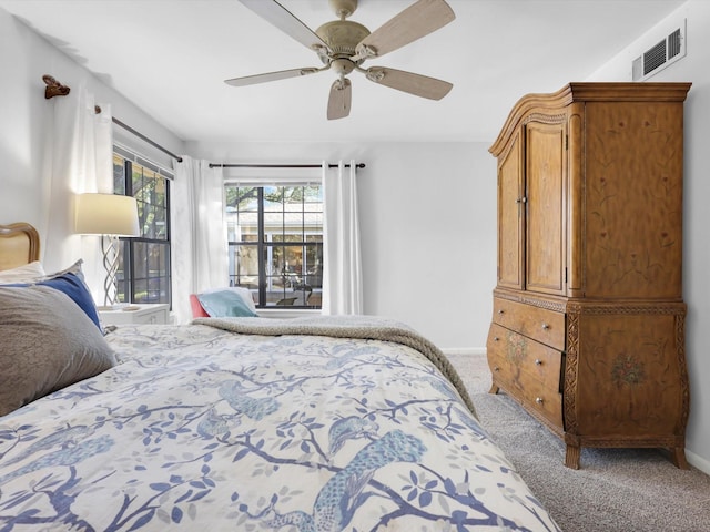 bedroom featuring ceiling fan and carpet flooring