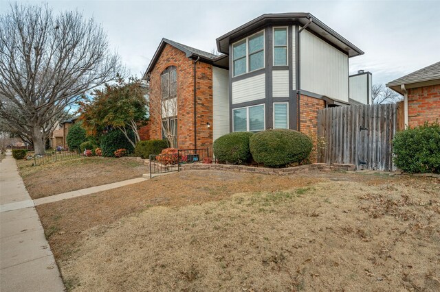 view of home's exterior featuring a lawn